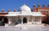 Salim Chishti (1478 – 1572) was a Sufi saint of the Chishti Order during the Mughal Empire (1526 - 1757) in South Asia.<br/><br/>

Chishti's tomb was originally built with red sandstone but later converted into a beautiful marble mausoleum. Salim Chishti's Mazar (tomb) is in the middle of the Emperor's Courtyard at Fatehpur Sikri.<br/><br/>

The mausoleum was constructed by Akbar as a mark of his respect for the Sufi saint, who foretold the birth of his son, who was named Prince Salim after him and later succeeded Akbar to the throne of the Mughal Empire, as Jahangir.<br/><br/>

Fatehpur Sikri (the City of Victory) was built during the second half of the 16th century by the Emperor Akbar ((r. 1556-1605)). It was the capital of the Mughal Empire for 10 years.